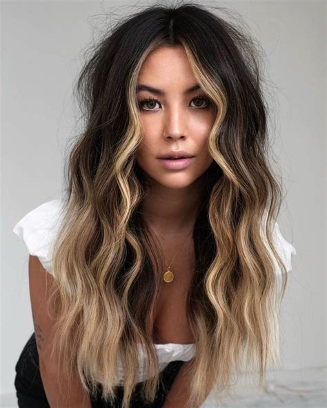 Scoop the <b>hair</b> up with the brush and direct the nozzle up in the same direction to create flicked wispy ends. . Dark hair inspo